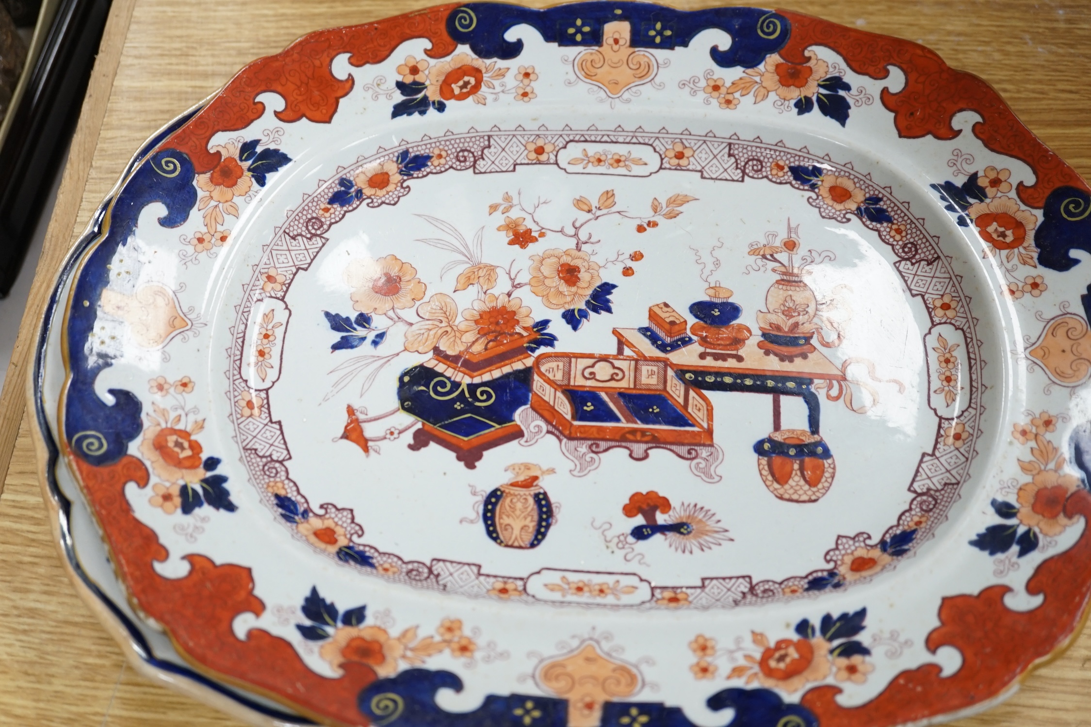 Seventeen ironstone items including two jardinières, a tureen and a quantity of plates, largest 28cm high. Condition - poor to fair